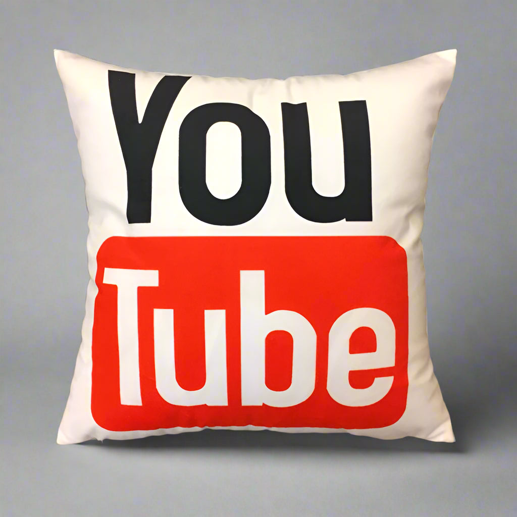 Pillow with YouTube logo on a brown background